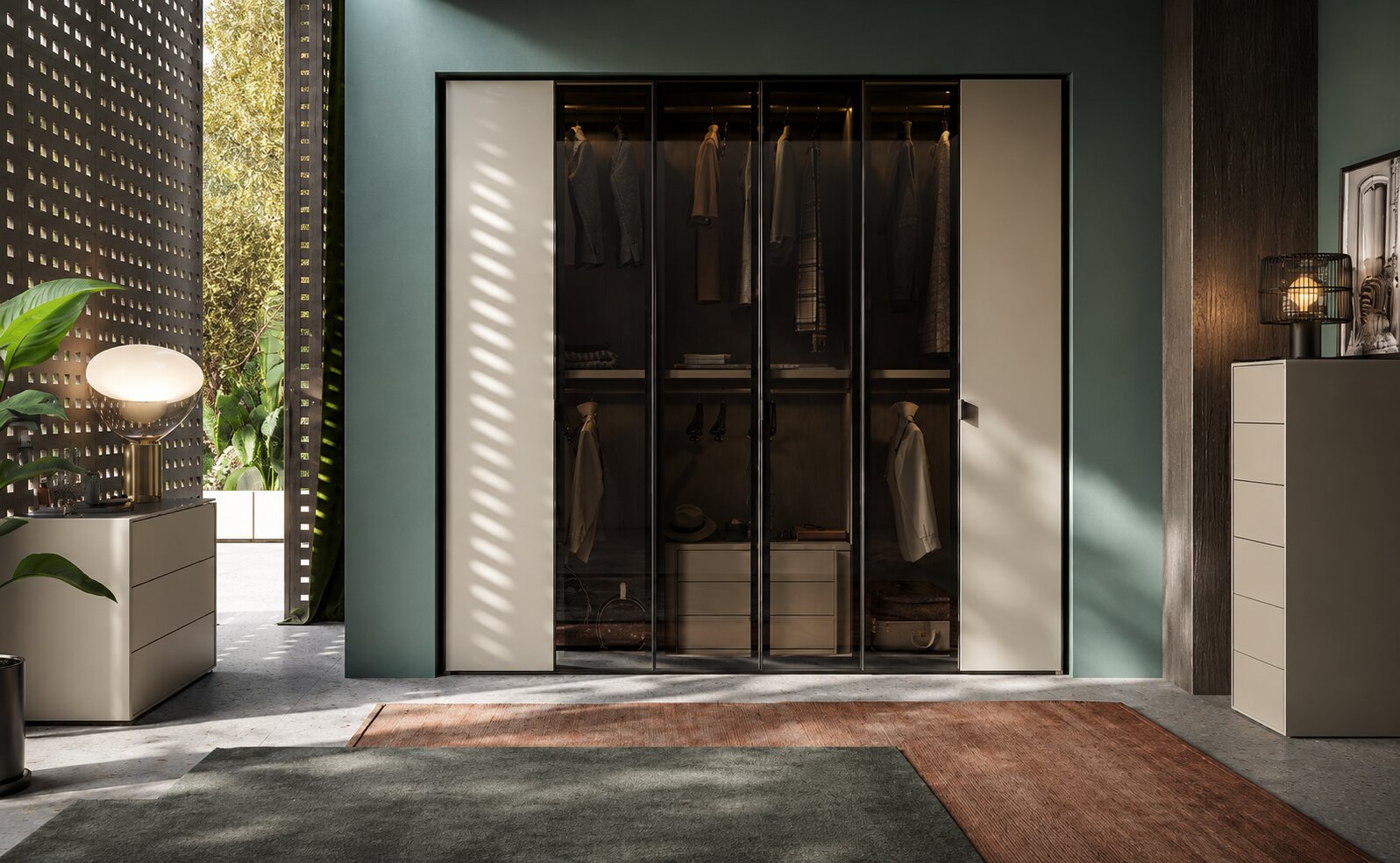 Walk-in wardrobe with glass doors and lit hanging rails