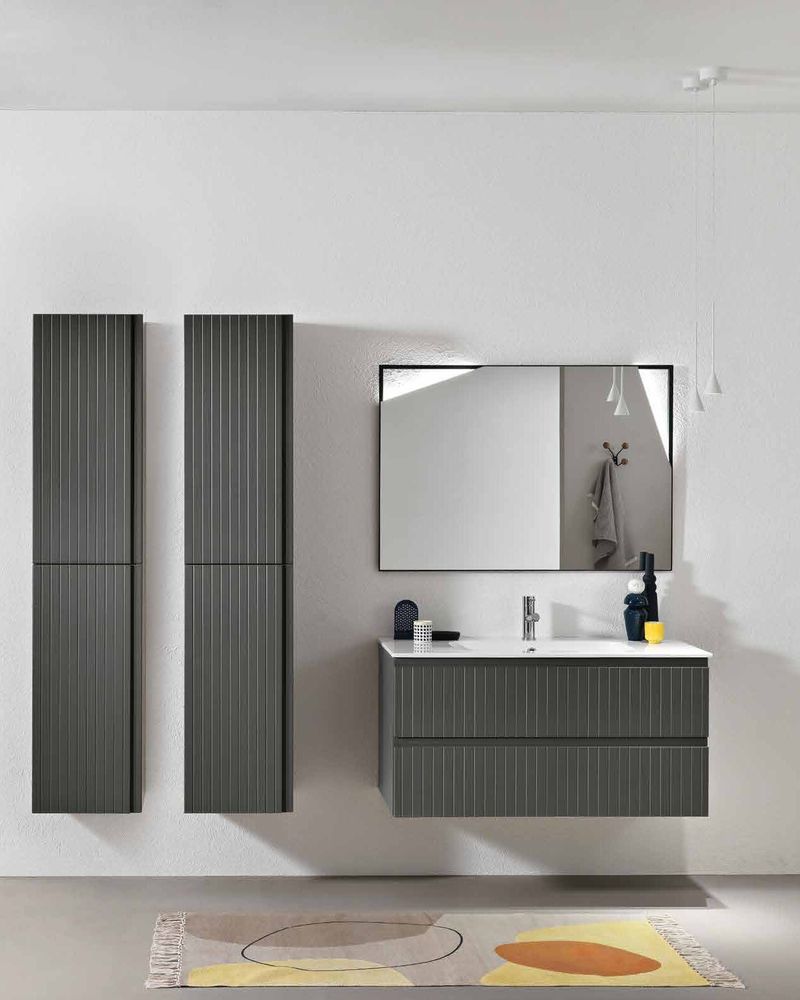 Marea anthracite fluted vanity and tall columns in a bathroom