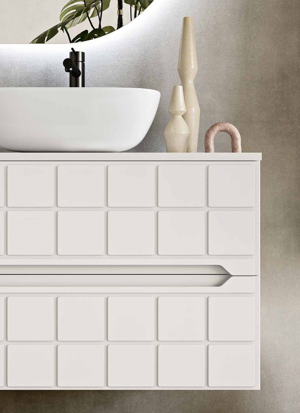 Isola white vanity with raised-square fronts and a ceramic basin