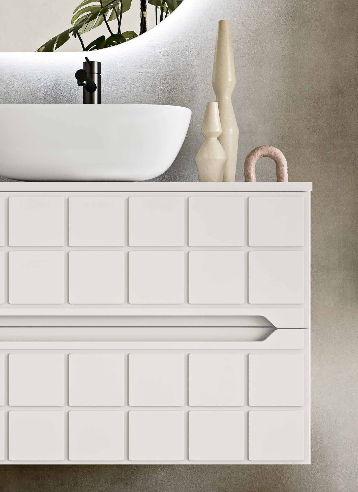Isola white vanity with raised-square fronts and a ceramic basin