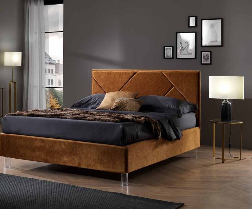 Cielo bed with a geometric stitched headboard in amber velvet