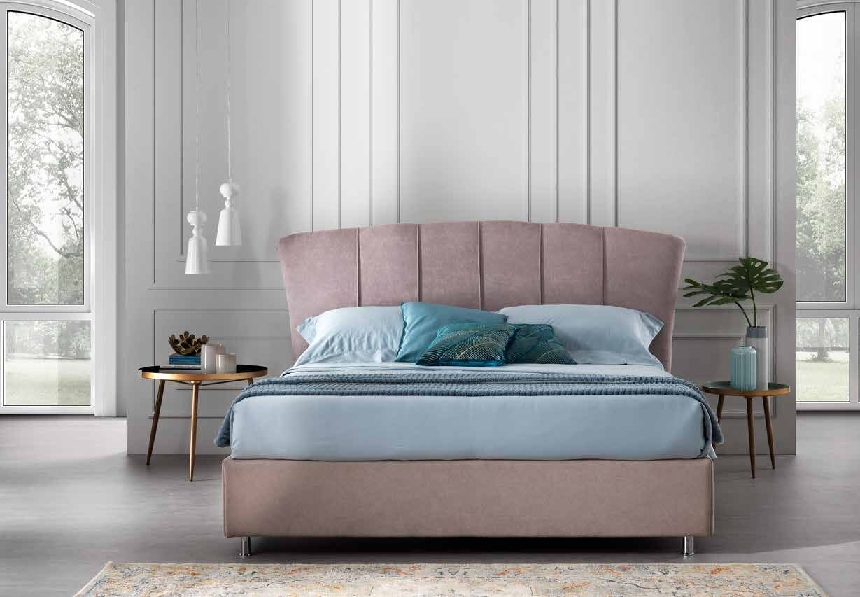 Comet bed with a fan-shaped channel-stitched headboard in blush