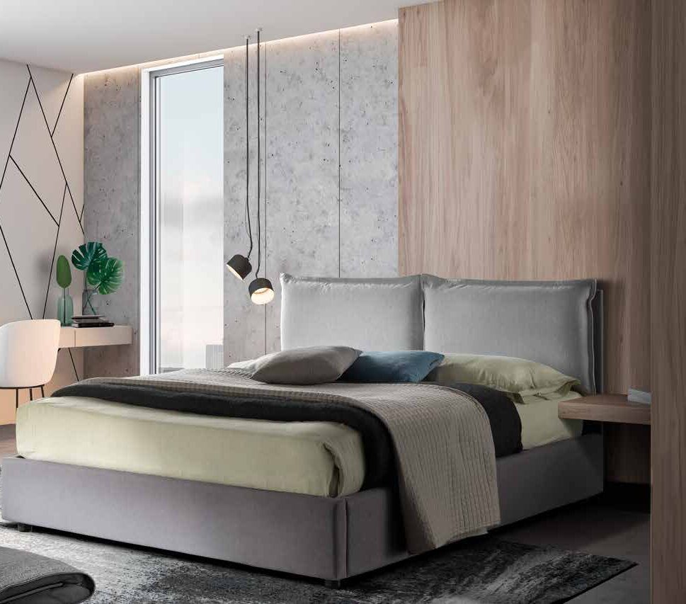 Lira bed with a cushion headboard in grey