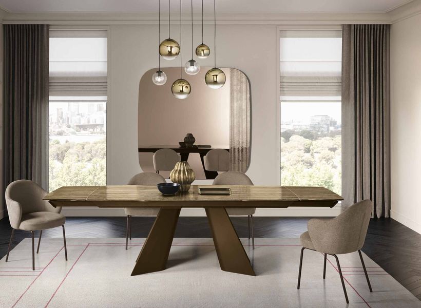 Festa extending table with a bronze striped glass top