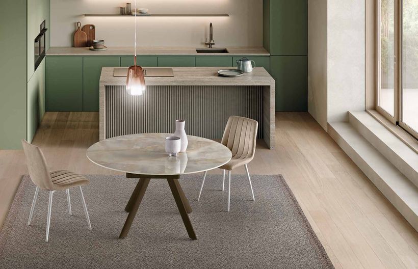 Dono table opened into a round, in an onyx-effect finish