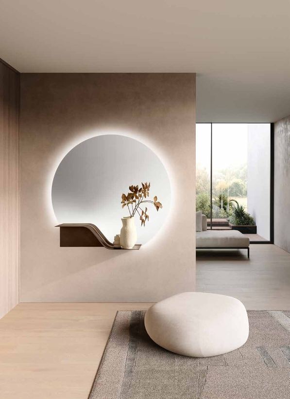 Como backlit mirror glowing in an entrance