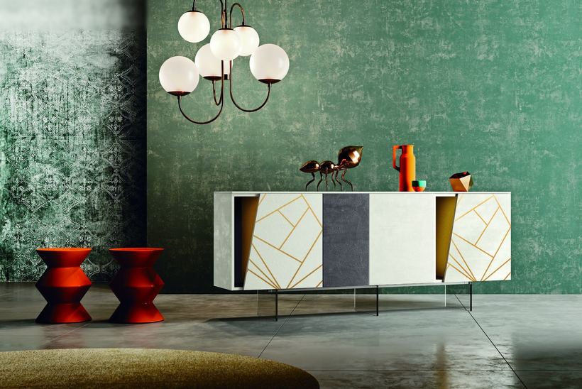 Cameo sideboard with golden lines on white against a green wall