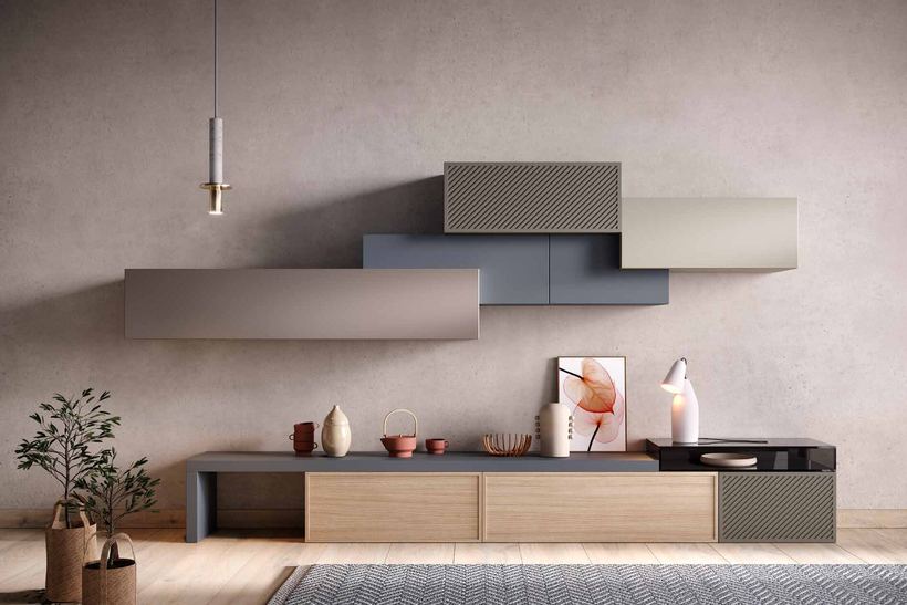 Dale wall unit with staggered cabinets in soft colours over a low base