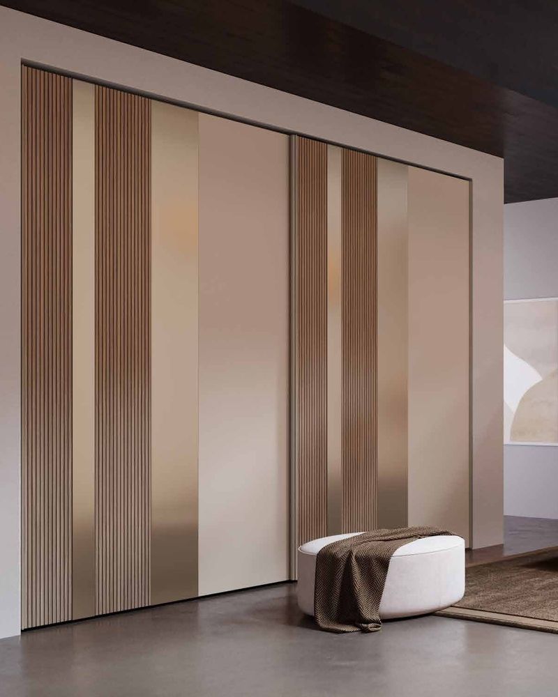Vita sliding wardrobe with cream panels and bronze glass strips