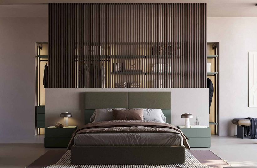 Pausa open walk-in wardrobe behind a bed, seen through a slatted screen