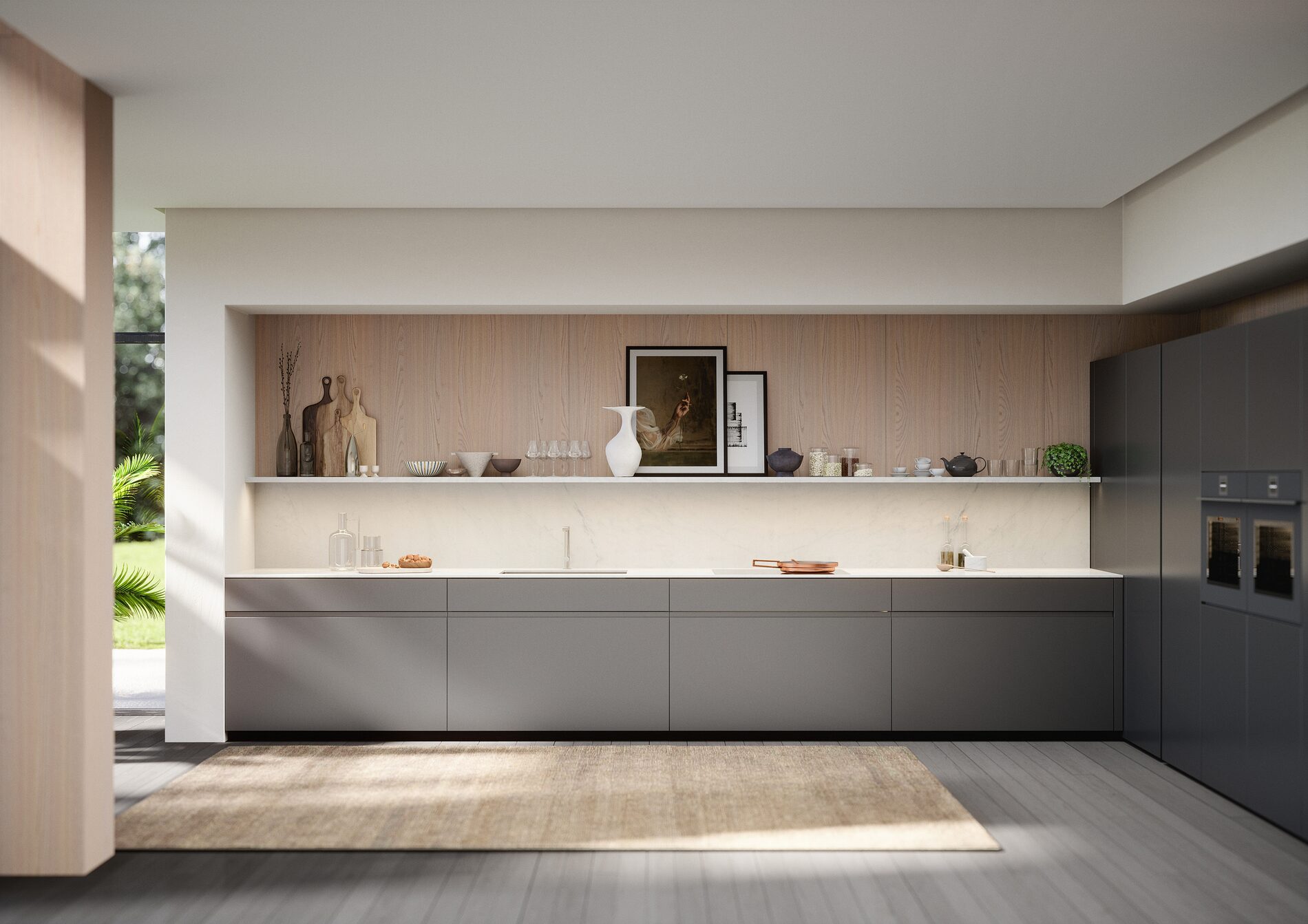 Handleless kitchen run with a stone worktop and integrated lit shelf